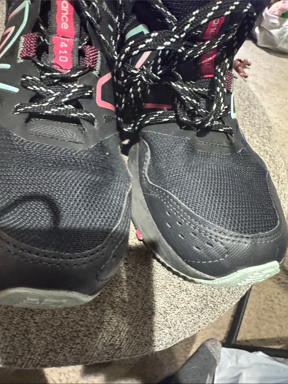 New Balance Women’s Black Athletic Sneakers with Pink and Teal Accents